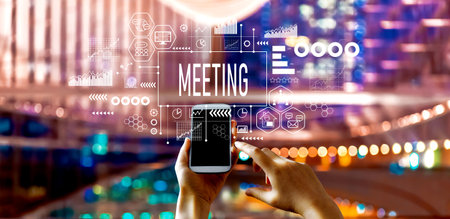 Meeting theme with big city at nightの写真素材