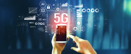 5G network theme with person using smartphoneの写真素材