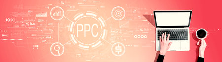 PPC - Pay per click concept with person using a laptopの写真素材