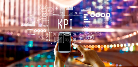 KPI - Key Performance Indicator theme with big city at nightの写真素材