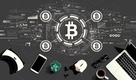 Bitcoin theme with electronic gadgets and office suppliesの写真素材