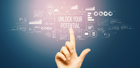 Unlock your potential theme with hand pressing a buttonの写真素材