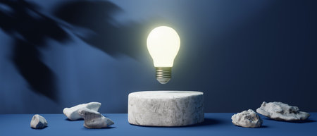 Light bulb on a podium with shadow of leaves - 3Dの写真素材