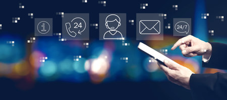 Customer service theme with businessman using a tablet computerの写真素材