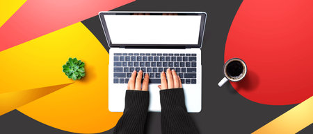 Person using a laptop computerの写真素材