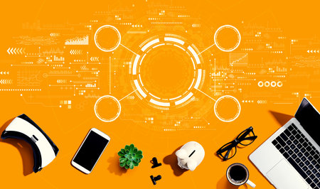 Tech circle with electronic gadgets and office suppliesの写真素材