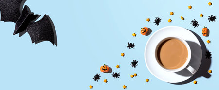 Halloween theme with a cup of coffeeの写真素材