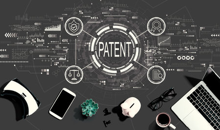 Patent concept with electronic gadgets and office suppliesの写真素材