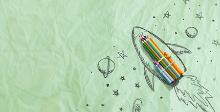 Back to school theme with hand drawn rocket and colored pencilsの写真素材