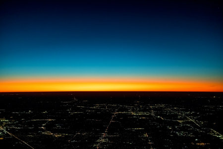 Dramatic sunset over the horizon with Tokyo in the foregroundの写真素材