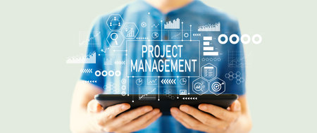 Project management theme with man using a tabletの写真素材