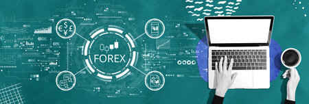 Forex trading concept with person using a laptopの写真素材