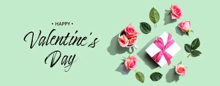 Valentines Day message with a gift box and rosesの写真素材
