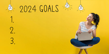 2024 goals with woman using a laptopの写真素材
