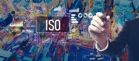 ISO theme with businessman in city at nightの写真素材