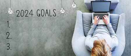 2024 goals with man using a laptopの写真素材