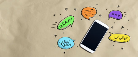 Speech bubbles and a smartphoneの写真素材
