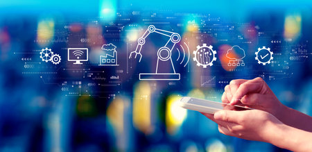 Smart industry concept with person using a smartphone at nightの写真素材