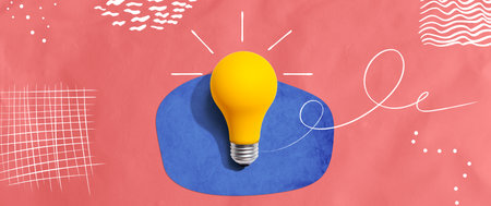 Yellow light bulb with handwritten sketchの写真素材