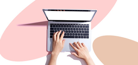Person using a laptop computerの写真素材