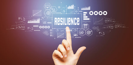 Resilience theme with hand pressing a buttonの写真素材