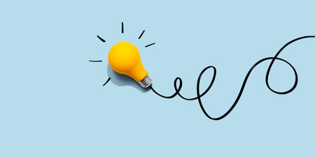 Brainstorming concept with a yellow light bulbの写真素材