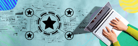 Rating star concept with person using a laptopの写真素材