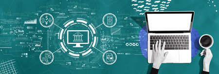 Cryptocurrency fintech theme with person using a laptopの写真素材