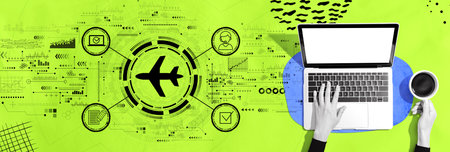 Flight ticket booking concept with person using a laptopの写真素材