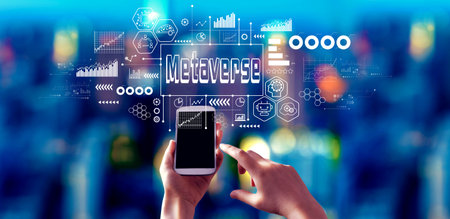 Metaverse theme with person using a smartphone at nightの写真素材