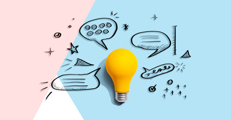 Brainstorming concept with a light bulb and speech bubblesの写真素材