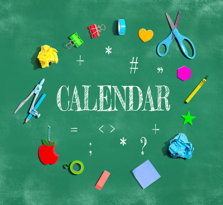 Calendar theme with school supplies on a chalkboardの写真素材