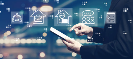 Remote Work theme with businessman using a tabletの写真素材