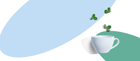 Shamrock leaves with coffee cupの写真素材