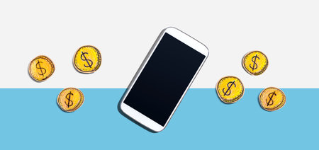 Blank smartphone with coins - earn online themeの写真素材
