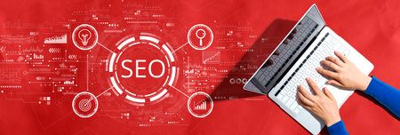 SEO concept with person using a laptopの写真素材
