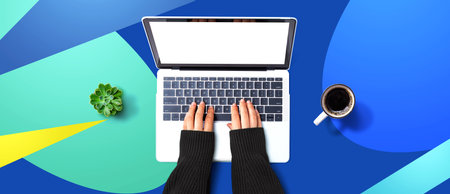 Person using a laptop computerの写真素材