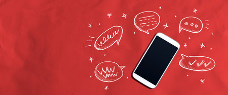 Speech bubbles and a smartphoneの写真素材