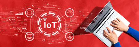 IoT theme with person using a laptopの写真素材