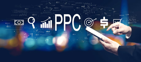 PPC - Pay per click concept with businessman using a tablet computerの写真素材