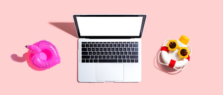 Laptop computer with summer theme items