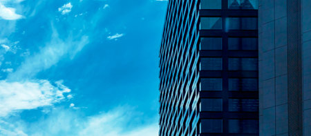 Closeup of skyscraper facade abstract urban backgroundの写真素材