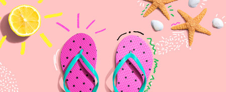 Summer concept with flip flops and lemon sunlightの写真素材