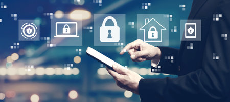 Cyber security theme with businessman using a tabletの写真素材