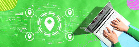 Map pin concept with person using a laptopの写真素材