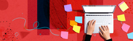 Laptop computer with many sticky notesの写真素材