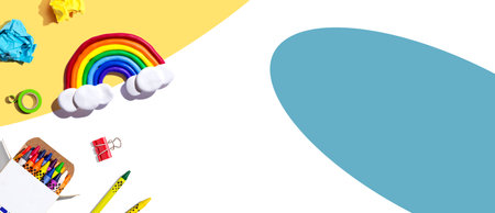 School supplies with a rainbow - overhead viewの写真素材