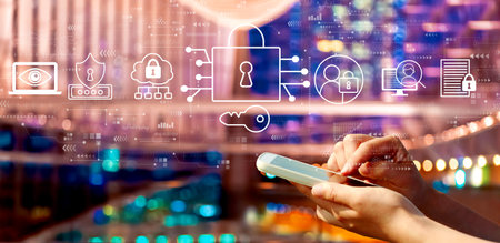Data Security concept with person using a smartphone in city at nightの写真素材