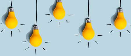 Hanging idea light bulbs - Business conceptの写真素材