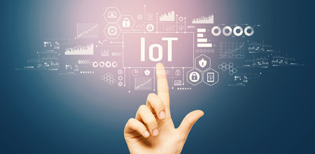 IoT theme with hand pressing a buttonの写真素材